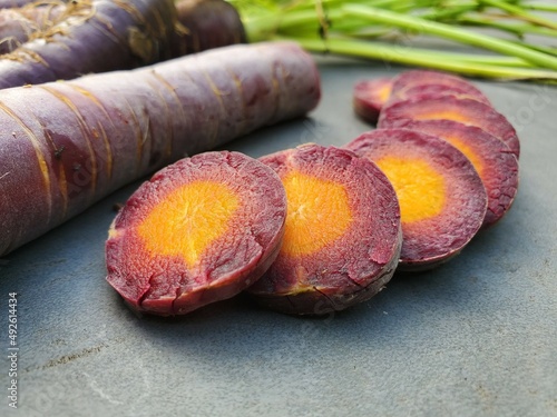 Cosmic Purple Carrots with orange insides 