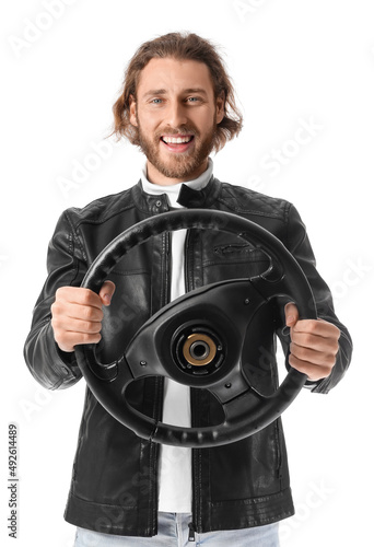 Handsome man with steering ...