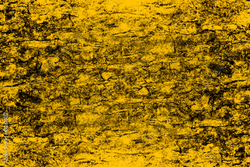 Abstract grunge textured yellow color old stone wall surface for background