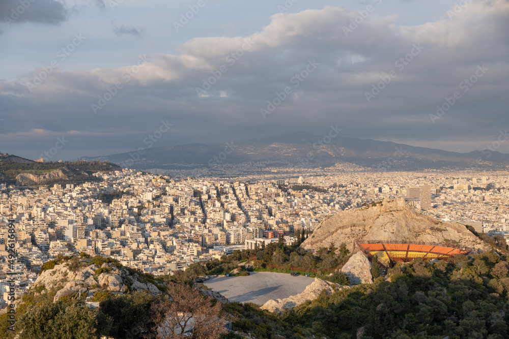 Athens Greek capital seen from above. Bird's eye view from Acropolis over the city with white houses, towers.