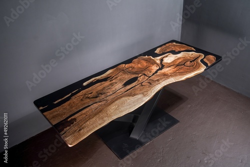 Modern wooden table made of epoxy