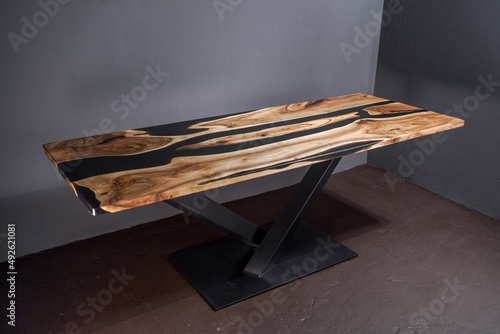 Modern wooden table made of epoxy