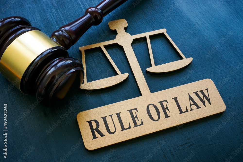 Plate in the form of scales and an inscription Rule of law Stock Photo Plate in the form of scales and an inscription Rule of law Stock Photo