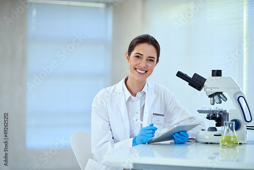 Ive found some fascinating findings. Shot of a female scientist working alone in the lab.