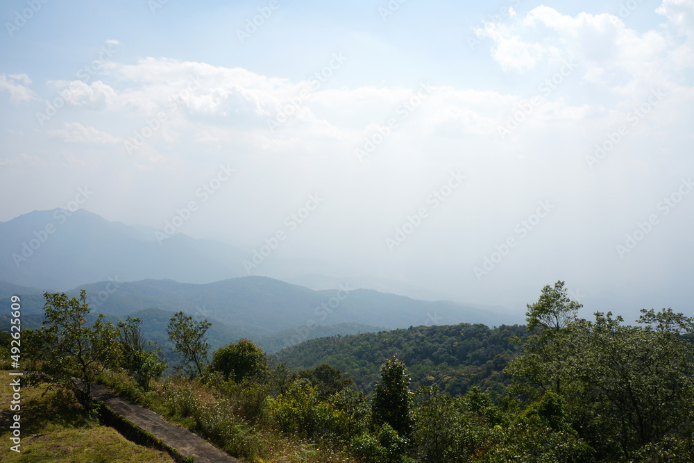 Beautiful view of mountains and bright blue skies in Northern Thailand. copy space.	