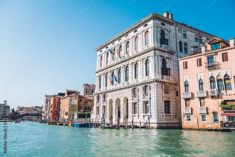 Landscape view on European cityscape of ancient district located at Grand Canal in Venice, architecture buildings during summer daytime - perfect place for honeymoon vacations on getaway trip
