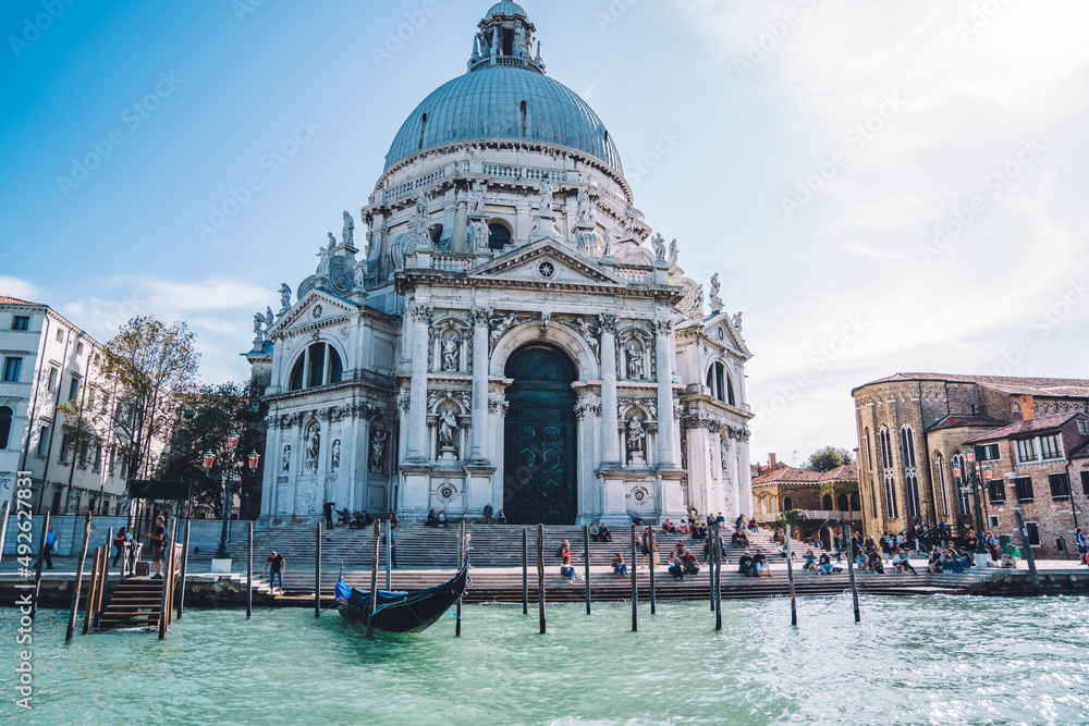 Picturesque view of ancient architecture building cathedral Santa Maria della Salute in historic center of beautiful Italian city - Venice, scenic Venetian landmark during international vacations