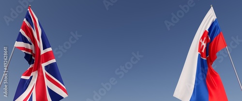 Photography Flags of Great Britain and Slovakia on flagpoles on sides