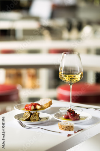 Romantic dinner, food and a glass of wine. Photograph of food on the table