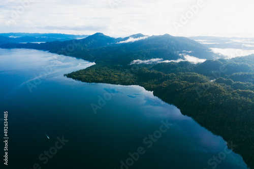 In the middle of the ocean. High angle shot of beautiful green islands in the ocean. © Terrence W/peopleimages.com