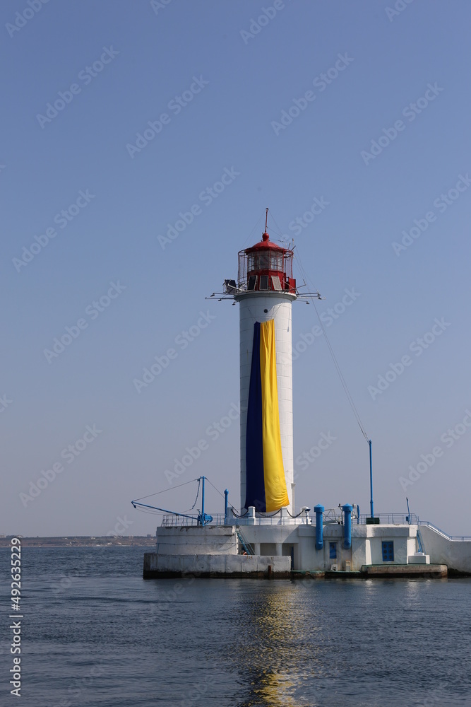 Odessa vorontsov lighthouse with blue-yellow flag of Ukraine