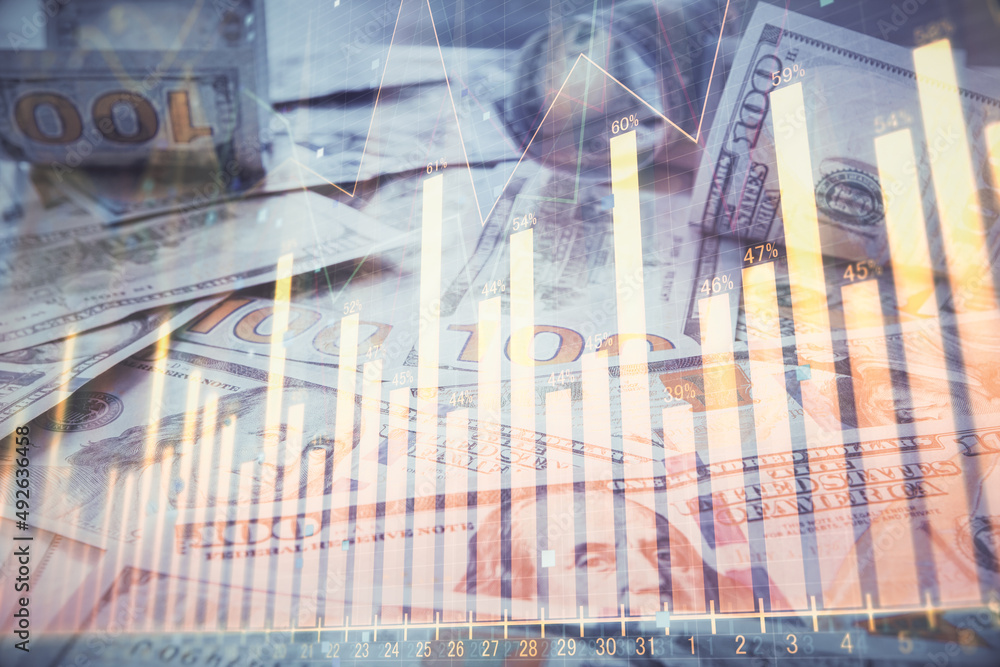 Multi exposure of forex chart drawing over us dollars bill background. Concept of financial success markets. Multi exposure of forex chart drawing over us dollars bill background. Concept of financial success markets.