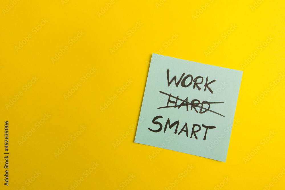 Text work smart handwritten on sticky note Text work smart handwritten on sticky note