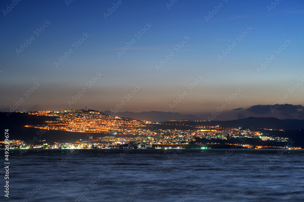 Tiberias city lights late at night on the Sea of Galilee