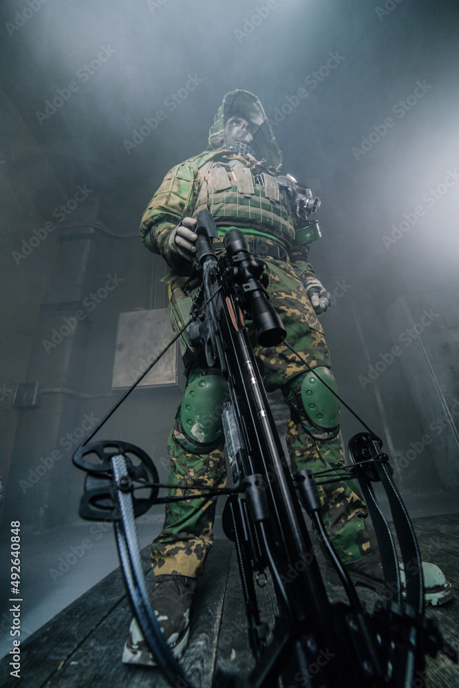 Fototapeta premium Fighter with a crossbow. Apocalypse