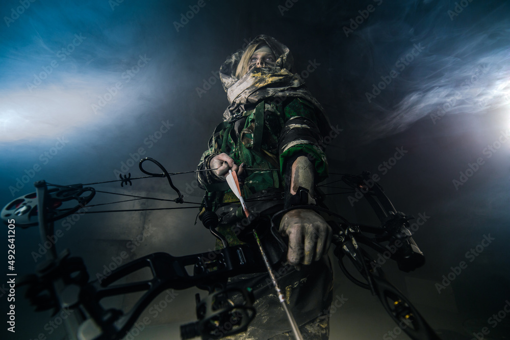 Fototapeta premium apocalypse fighters. a girl with a bow 