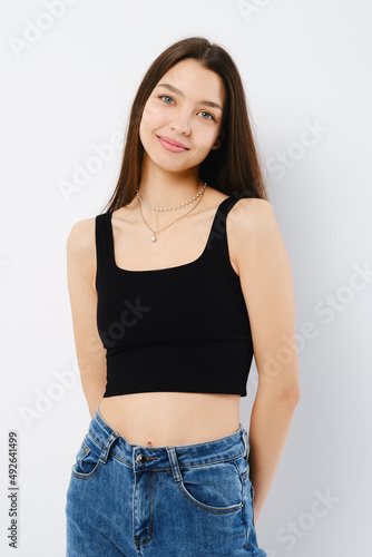 Portrait of shy and cute young woman