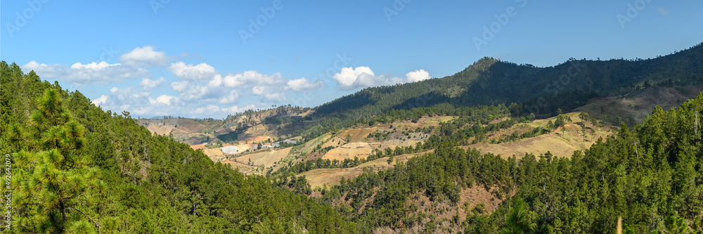 Highlands in the Dominican Republic. Beautiful view. Wide angle. Format 1x3