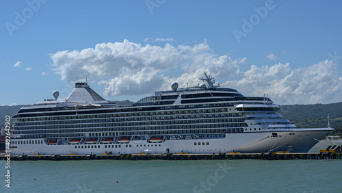Tourist liner moored in a cargo port in the Dominican Republic on a sunny day. © ALEKSEI