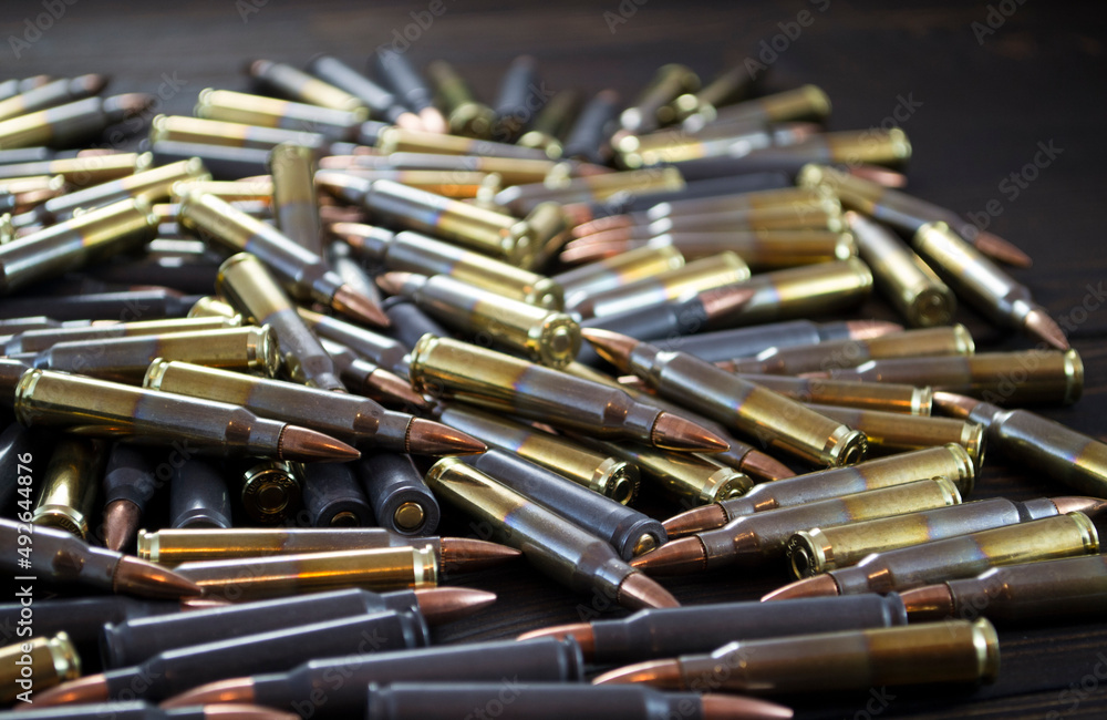 Fototapeta premium Golden pistol bullets