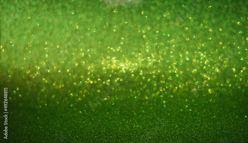 glittering green background texture for christmas decorations, selection focus