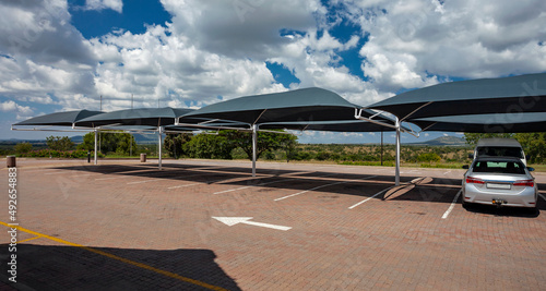 Car parking with awnings to create shade from the sun in Africa. photo