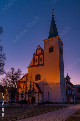 Church in LItovel town with sunrise colors on sky photo