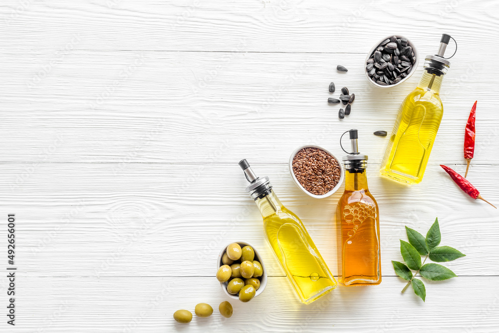 Poster Bottles of different types cooking oil Muurposter Europosters