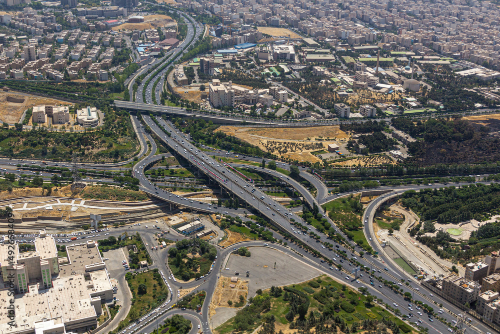 Aerial view of Hakim Expressway and Chamran Highway crossing in Tehran, capital of Iran.