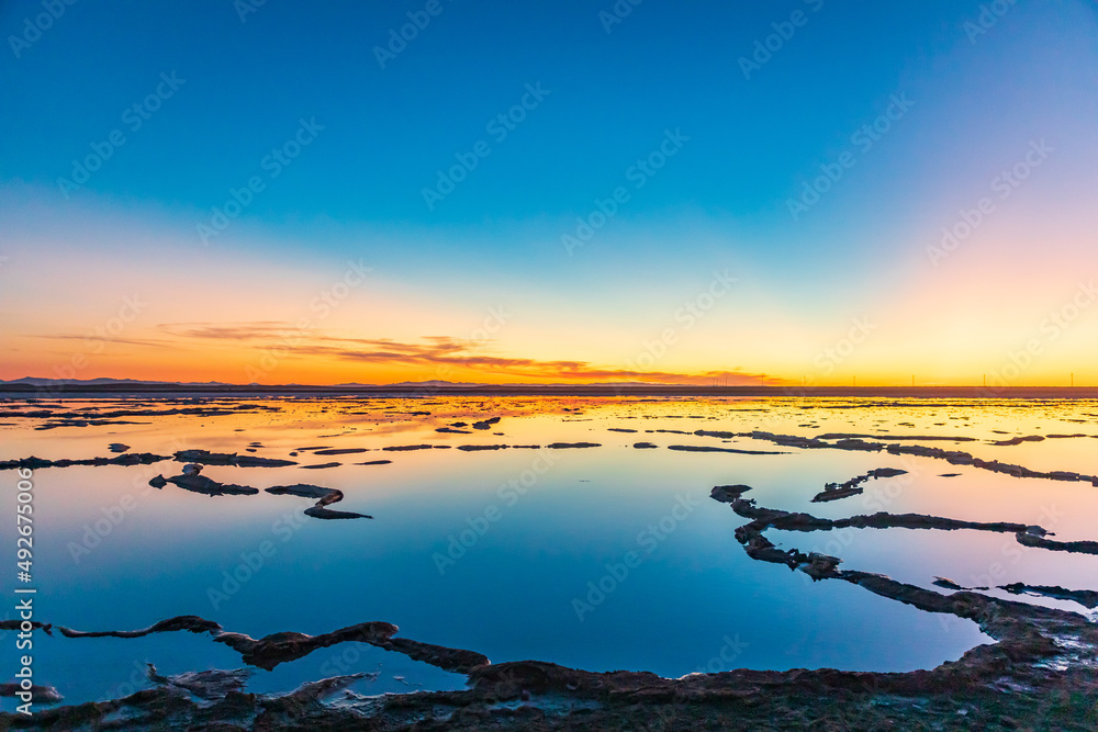 Salt ponds at sunset in Ba
