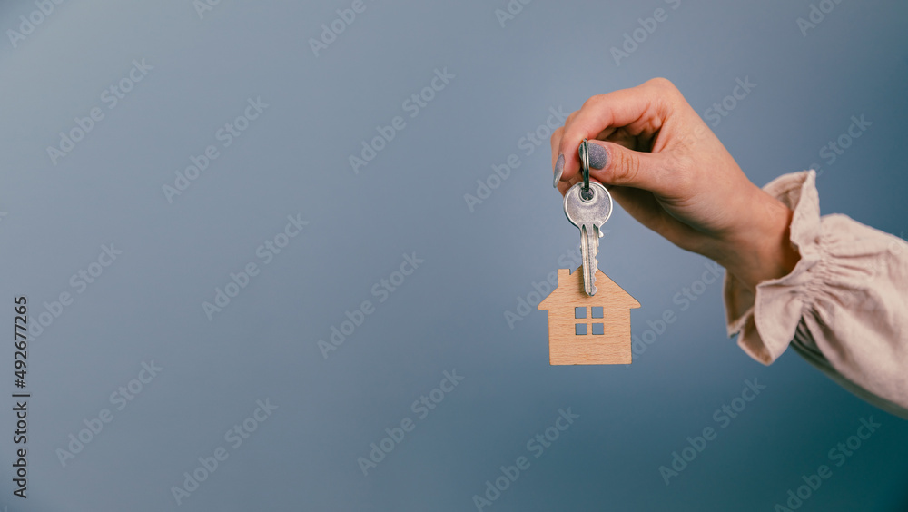 Agent holding house keys. Agent holding house keys.