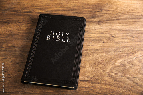 Holy Bible on the wooden table