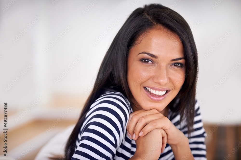 Enjoying some me-time. Closeup of a beautiful young woman at home. Enjoying some me-time. Closeup of a beautiful young woman at home.