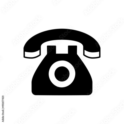 Telephone icon in black flat glyph, filled style isolated on white background © arum