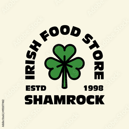 Shamrock badge logo. Irish clover emblem vector design. Saint Patrick's Day. Isolated retro logo