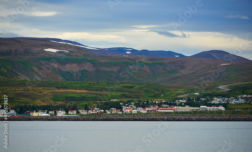 The fishing and whale watching town of Húsavík on the shores of Skjálfandi bay, north coast of Iceland photo
