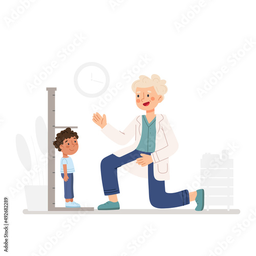 Child patient at doctor appointment. Pediatrician checking kid's health and growth. African American boy at medical examination at pediatric office.