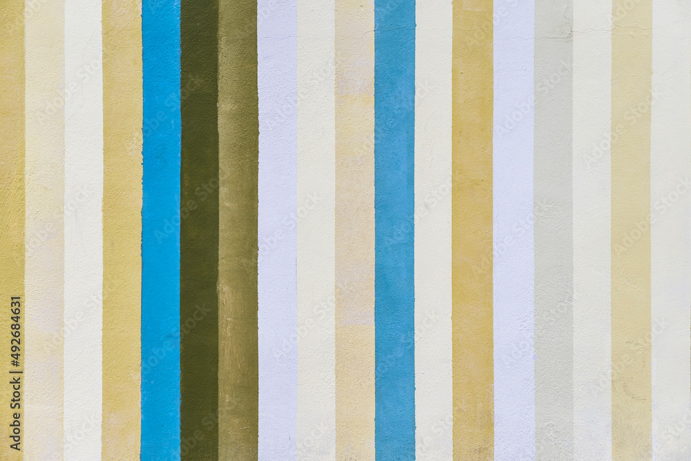 Grunge concrete wall with colorful stripes Grunge concrete wall with colorful stripes