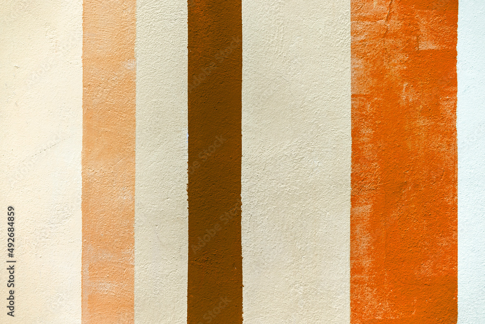 Fototapeta premium Grunge concrete wall with colorful stripes