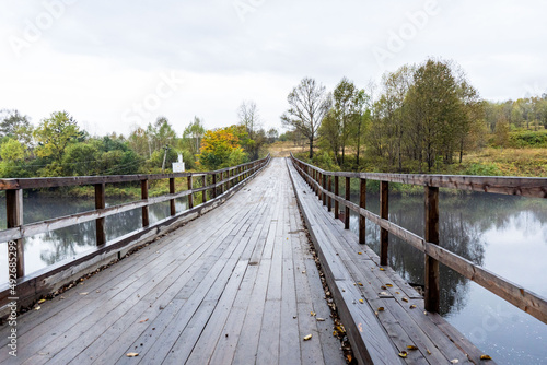 wooden bridge over the river. automobile wooden bridge
