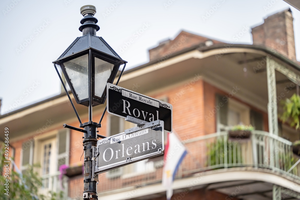 Obraz premium New Orleans, LA. Traditional street signs in the French Quarter, at Royal and Orleans streets.
