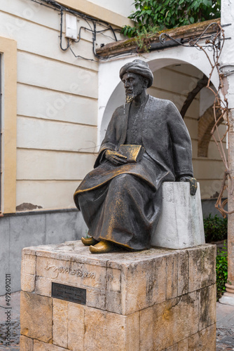 Statue of the Jewish scholar Moses Maimonides in Cordoba, Spain photo