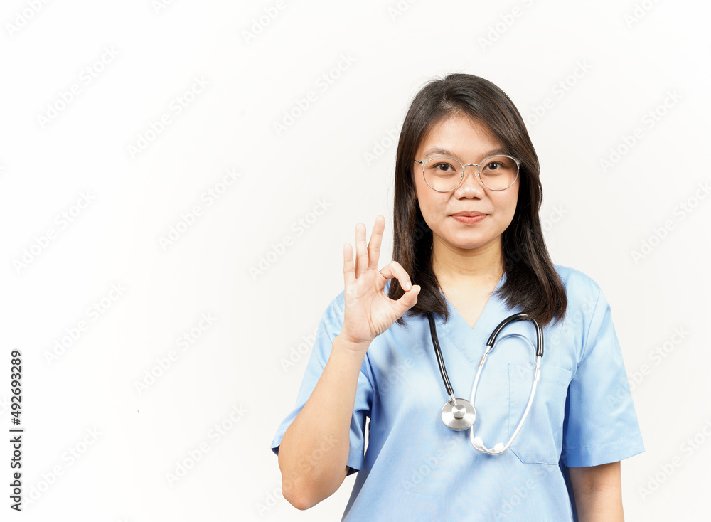 Showing OK Sign Of Asian Young Doctor Isolated On White Background Showing OK Sign Of Asian Young Doctor Isolated On White Background