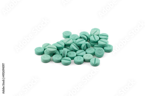 green pills isolated on white background