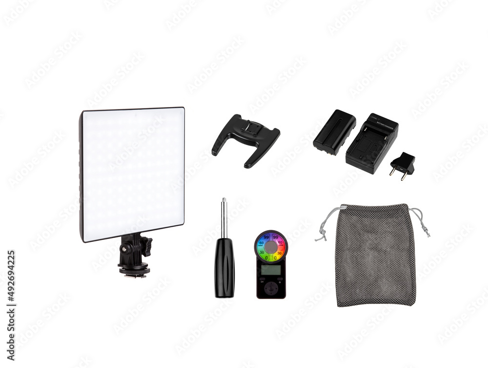Professional lighting equipment for video production isolated on white. Portable video light for filming video and video blogging. Lighting device for film production. Professional lighting equipment for video production isolated on white. Portable video light for filming video and video blogging. Lighting device for film production.