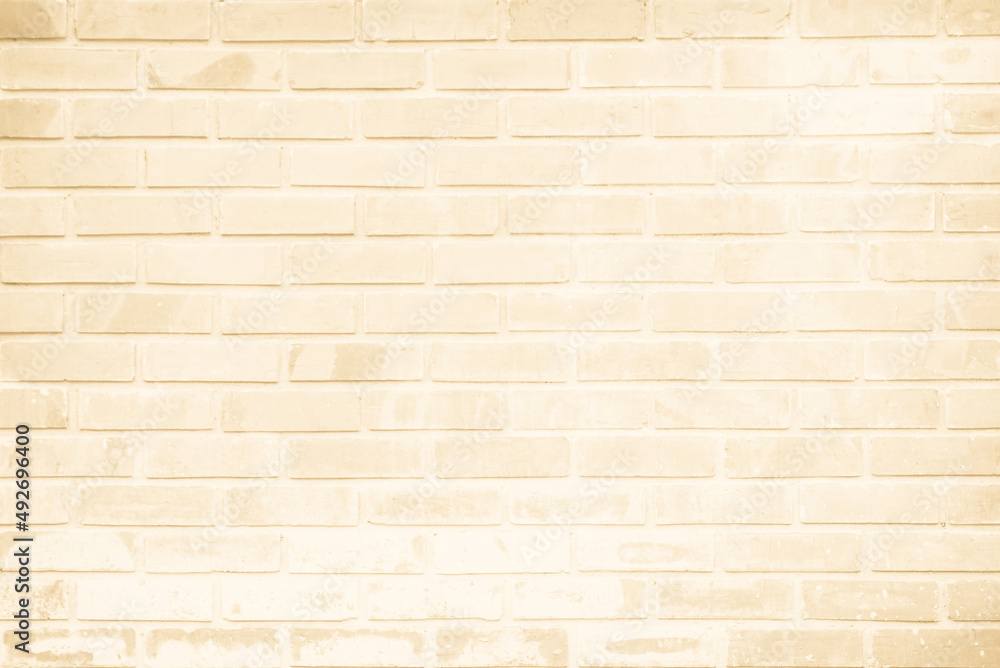 Obraz premium Cream brick wall texture background. Brickwork color beige bricks stack decoration.