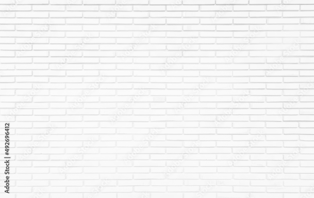 White brick wall texture background for stone tile block painted in grey light color wallpaper seamless decoration. White brick wall texture background for stone tile block painted in grey light color wallpaper seamless decoration.