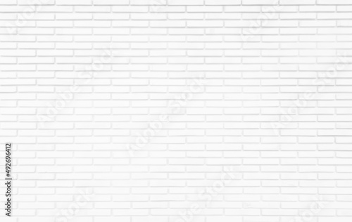 White brick wall texture background for stone tile block painted in grey light color wallpaper seamless decoration.