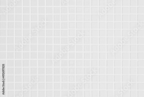 White ceramic wall and floor tile abstract background. Design geometric gray mosaic texture decoration.