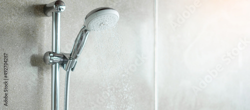  shower head with wall background in modern bathroom photo
